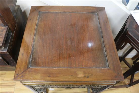 A Chinese huali wood urn stand, having panelled top and pierced frieze W.52cm